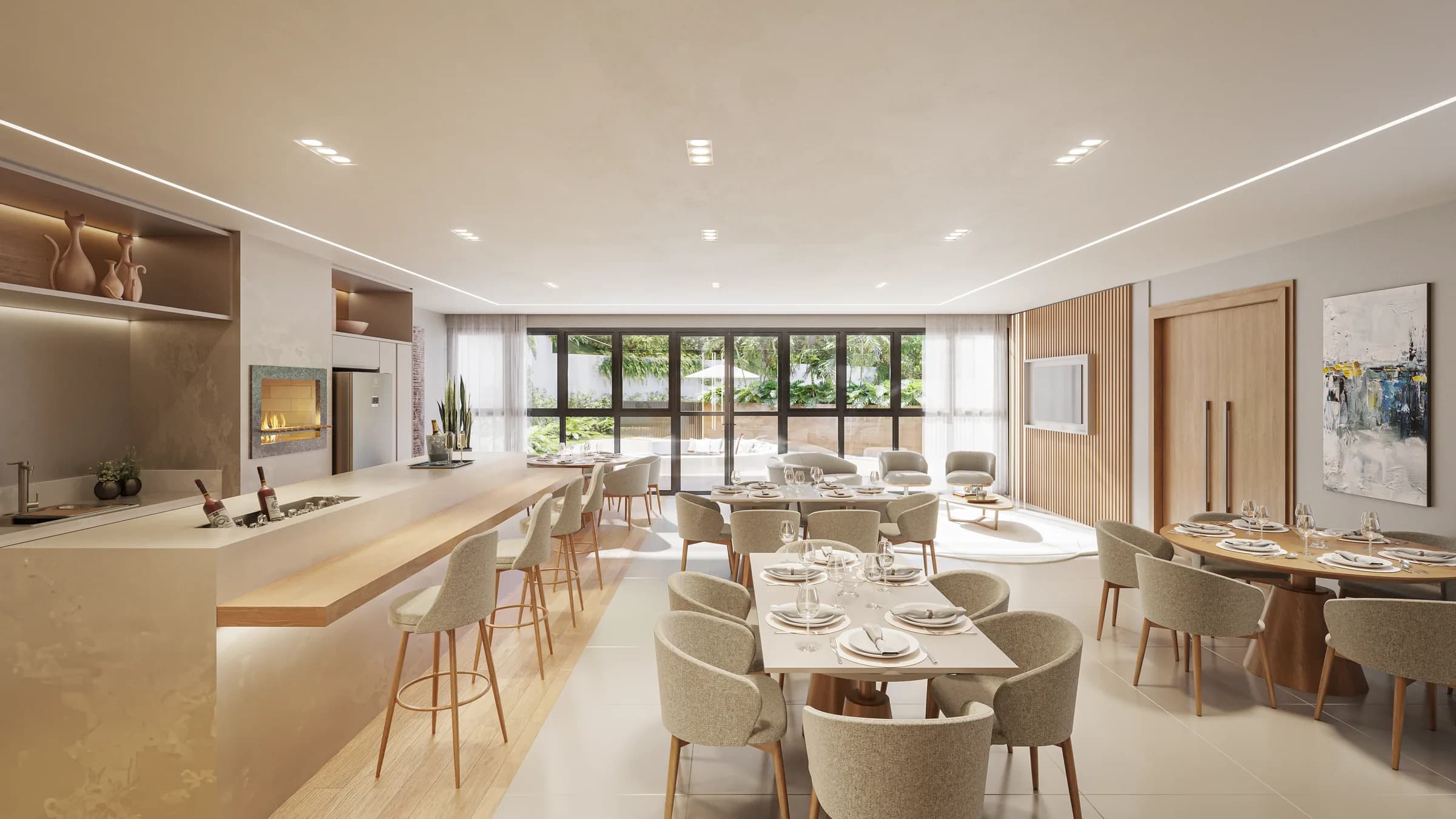 Ilha de Malta, espaço gourmet com bancada, lareira e mesas de jantar