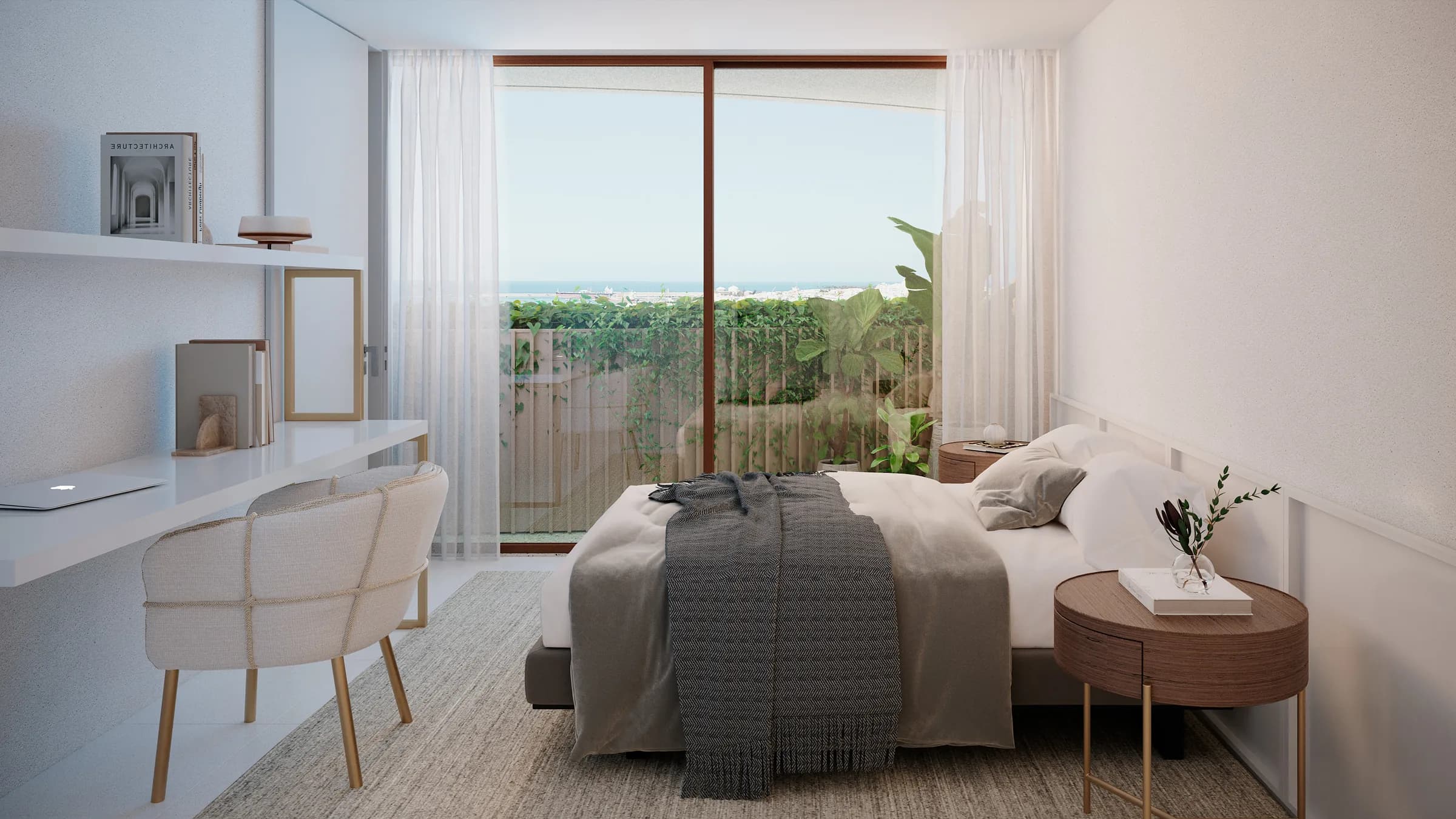 Lumin, quarto do T1 com secretária e porta de correr para a varanda