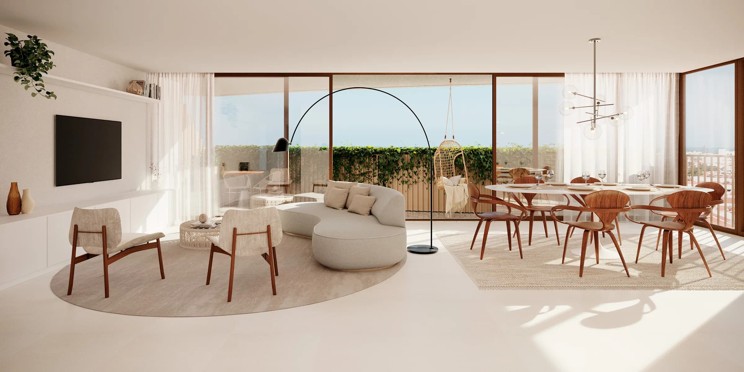 Lumin, sala de estar e jantar do T2 com sofá curvo e vista mar