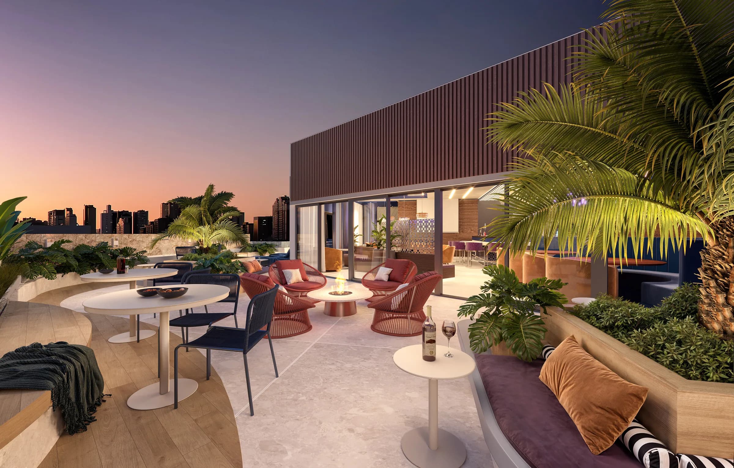 Wave, lounge externo do rooftop com o skyline de Curitiba ao entardecer